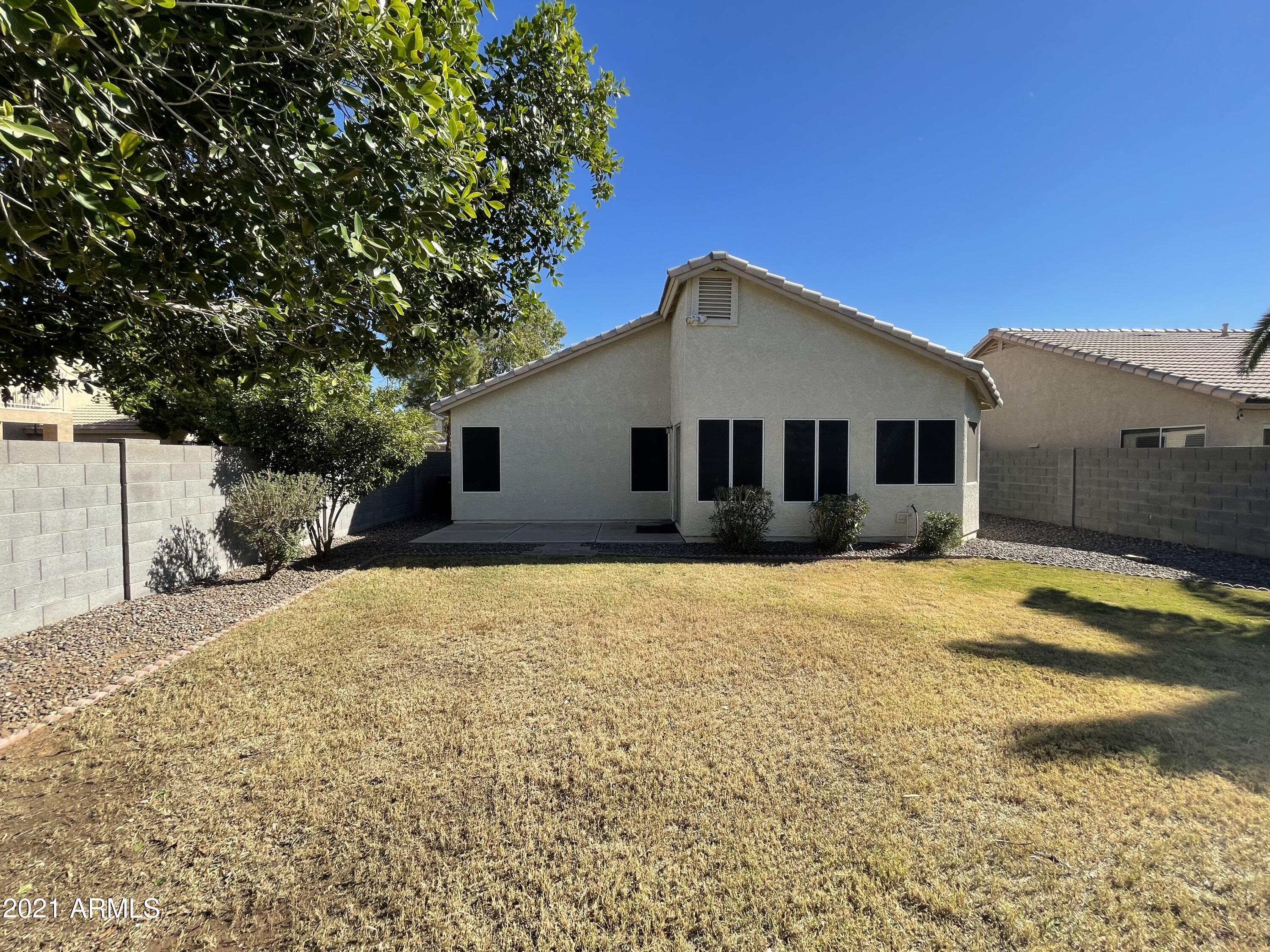 2702 South Ananea Mesa, AZ 85209 - Photo 5 of 15 a front view of a house with a yard