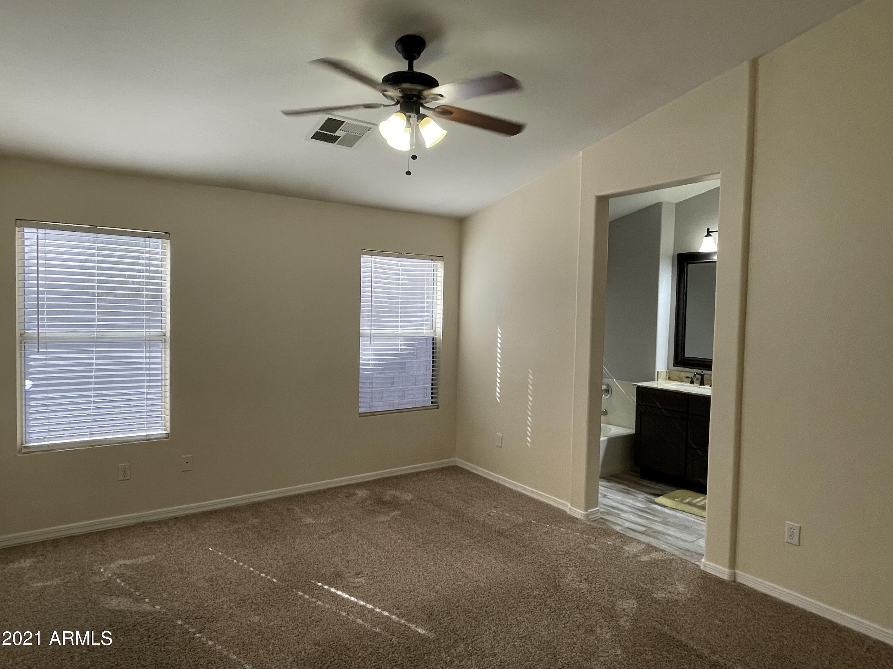 2702 South Ananea Mesa, AZ 85209 - Photo 9 of 15 a view of an empty room with a window