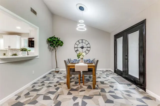 a workspace with furniture and window