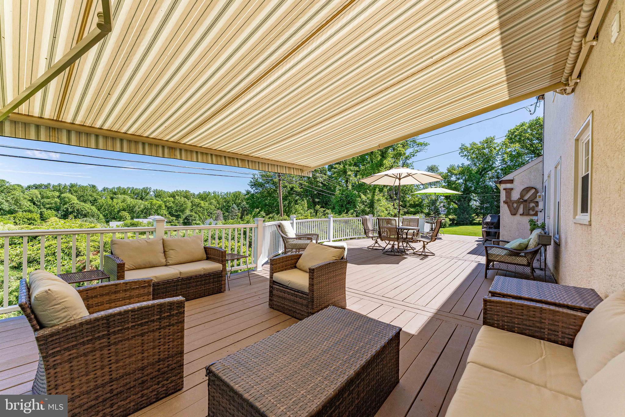 84 North Spring Lane Phoenixville, PA 19460 - Photo 48 of 51 a view of a patio with couches chairs and a potted plant