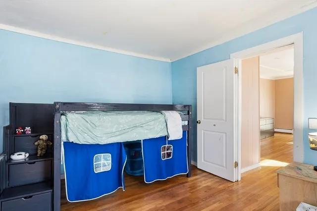 a view of a livingroom with wooden floor