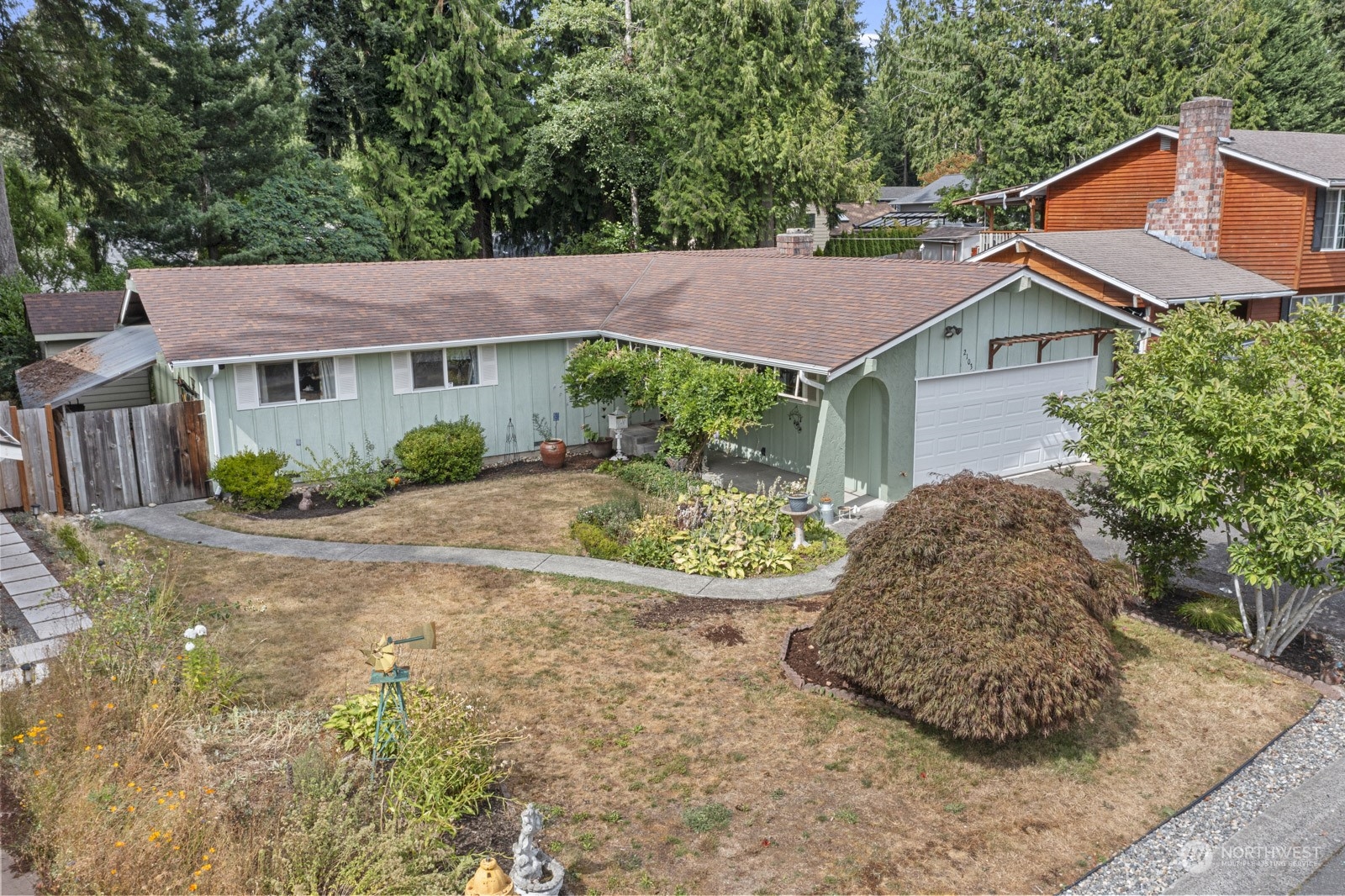 2103 Timber Trail Bothell, WA 98012 - Photo 1 of 40 front view of a house with a yard