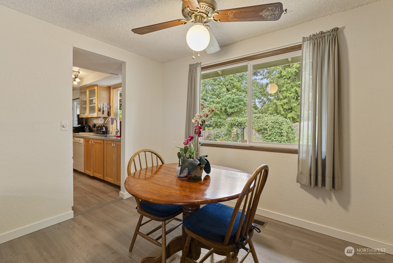2103 Timber Trail Bothell, WA 98012 - Photo 18 of 40 a view of a dining room with furniture window and outside view