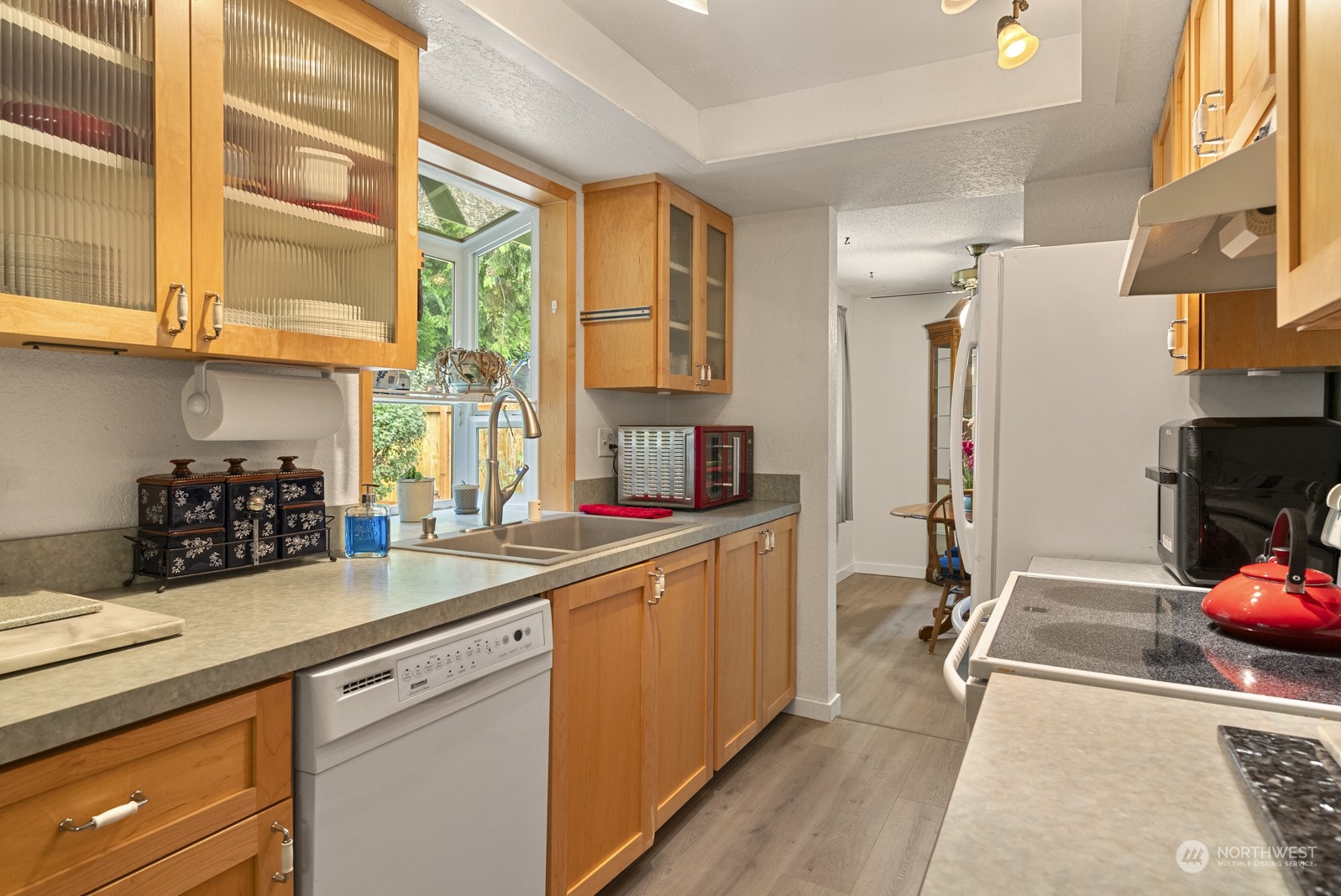 2103 Timber Trail Bothell, WA 98012 - Photo 21 of 40 a kitchen with a sink and cabinets
