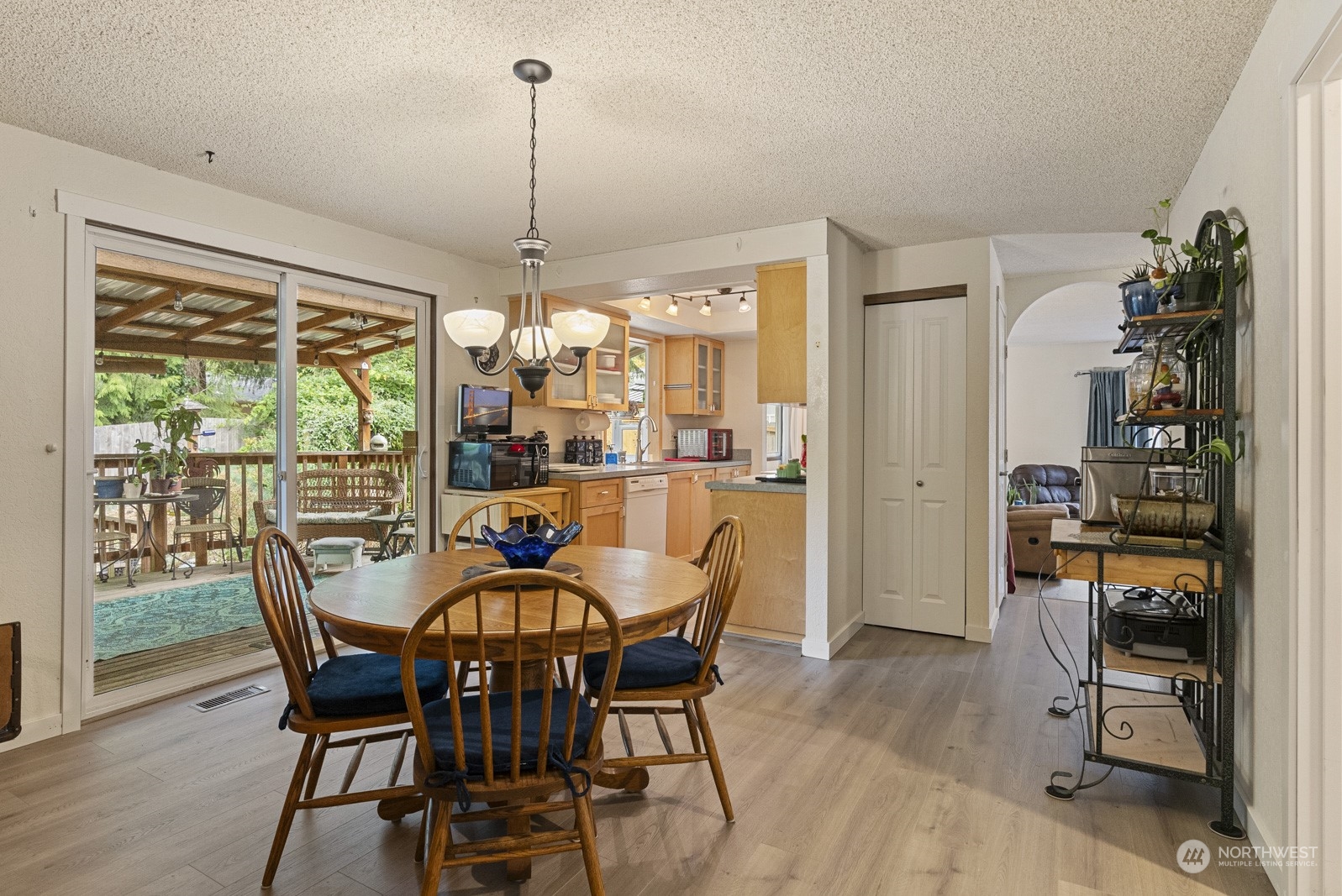 2103 Timber Trail Bothell, WA 98012 - Photo 26 of 40 a dining room with furniture window wooden floor