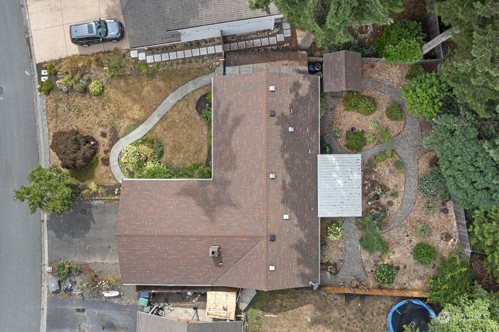 2103 Timber Trail Bothell, WA 98012 - Photo 3 of 40 an aerial view of a house with a swimming pool