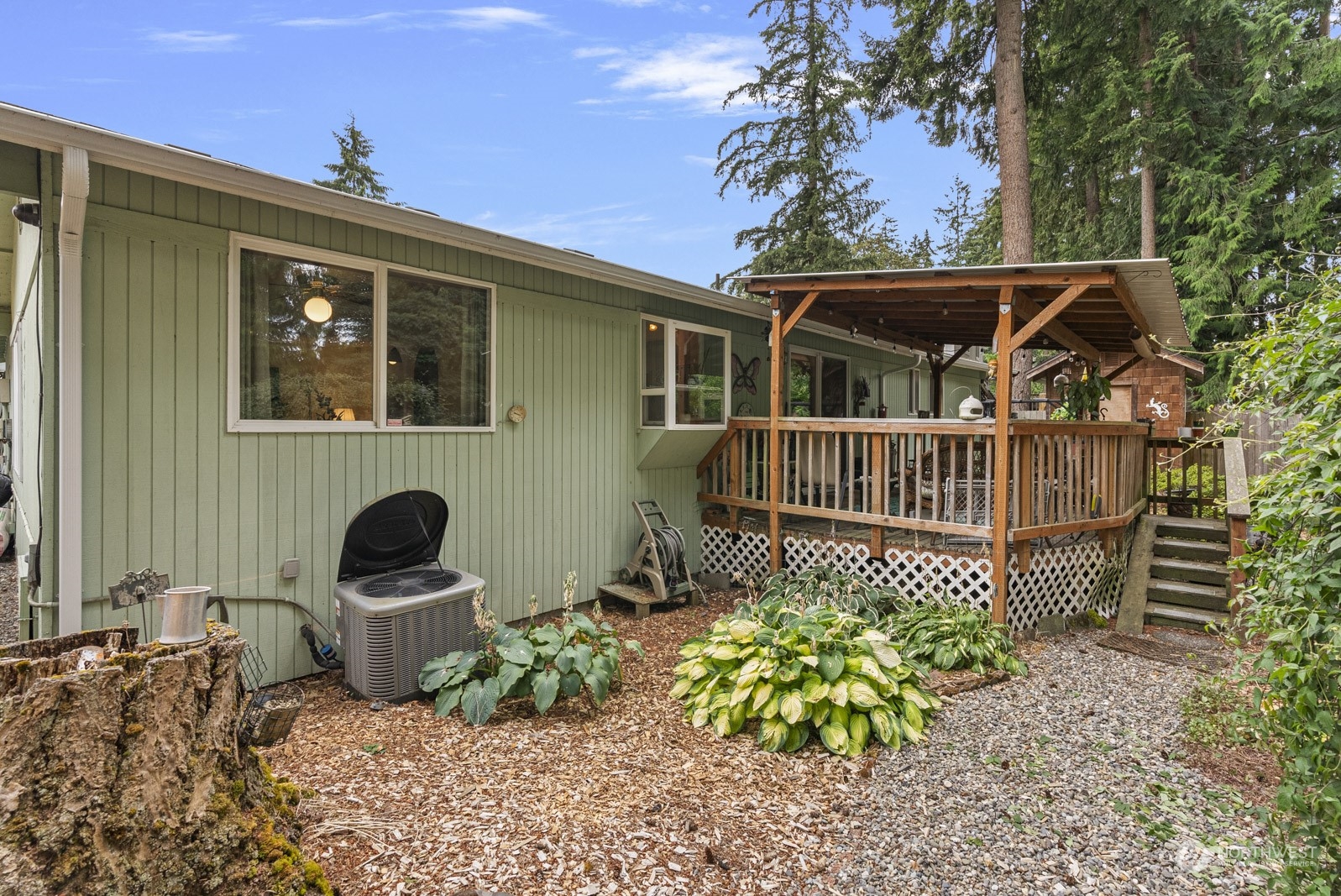 2103 Timber Trail Bothell, WA 98012 - Photo 34 of 40 a front view of a house with garden