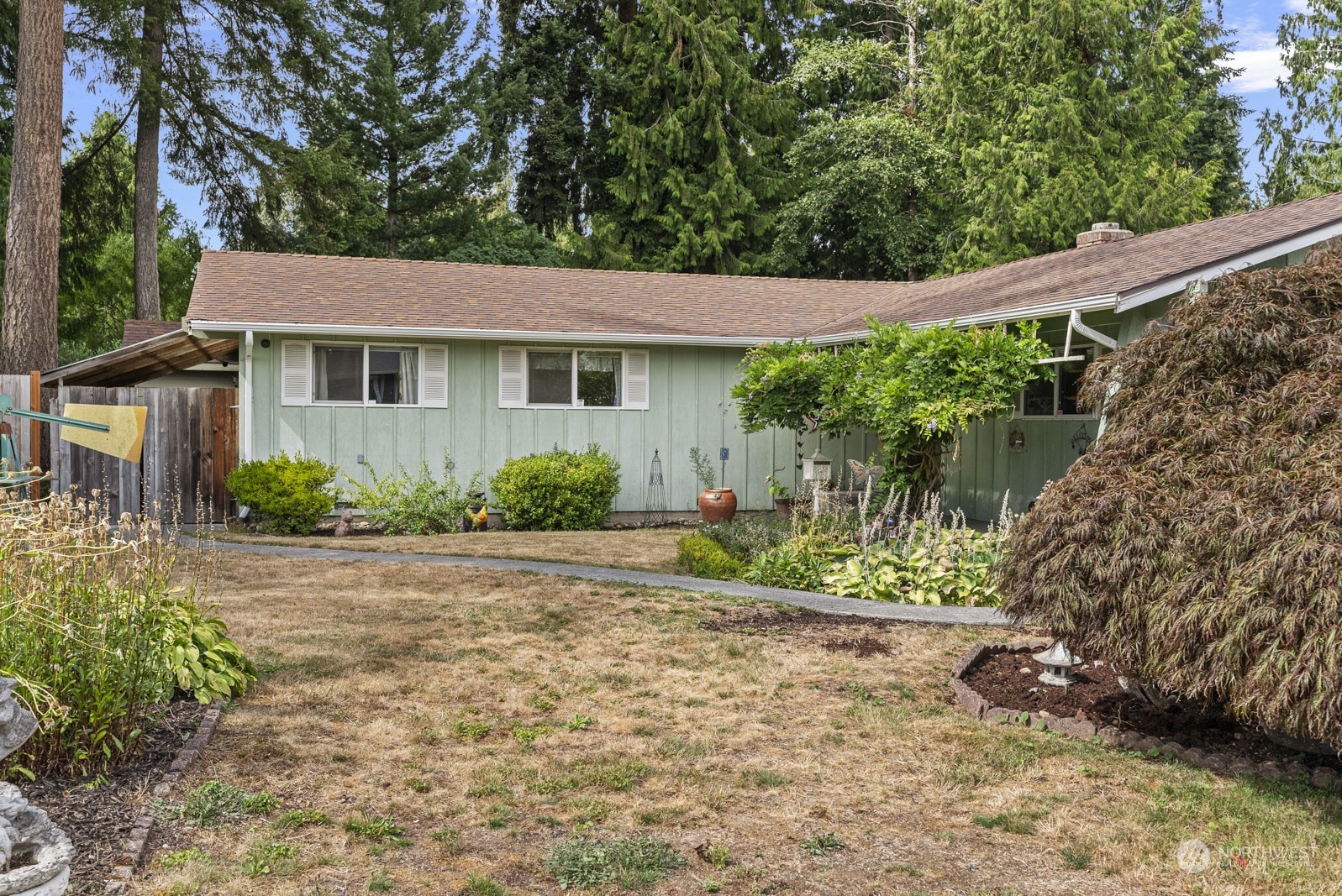 2103 Timber Trail Bothell, WA 98012 - Photo 8 of 40 front view of a house with a yard