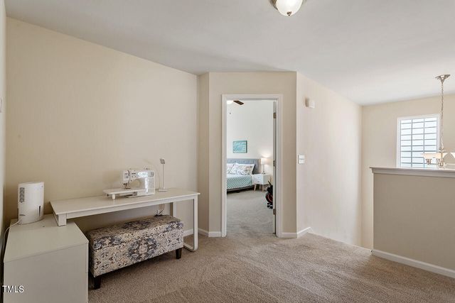 a bedroom with a bed and a cabinets