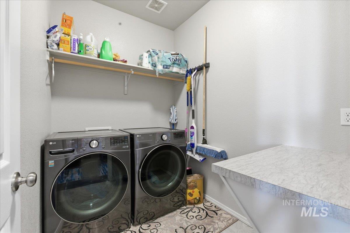 16202 Dietz Way Caldwell, ID 83607 - Photo 21 of 31 Laundry room with washing machine and clothes dryer