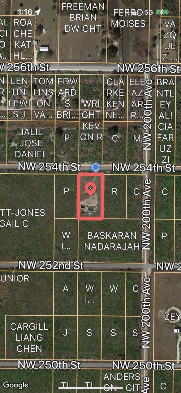 20106 Northwest 254th Street Okeechobee, FL 34972 - Photo 2 of 9 a front view of a building