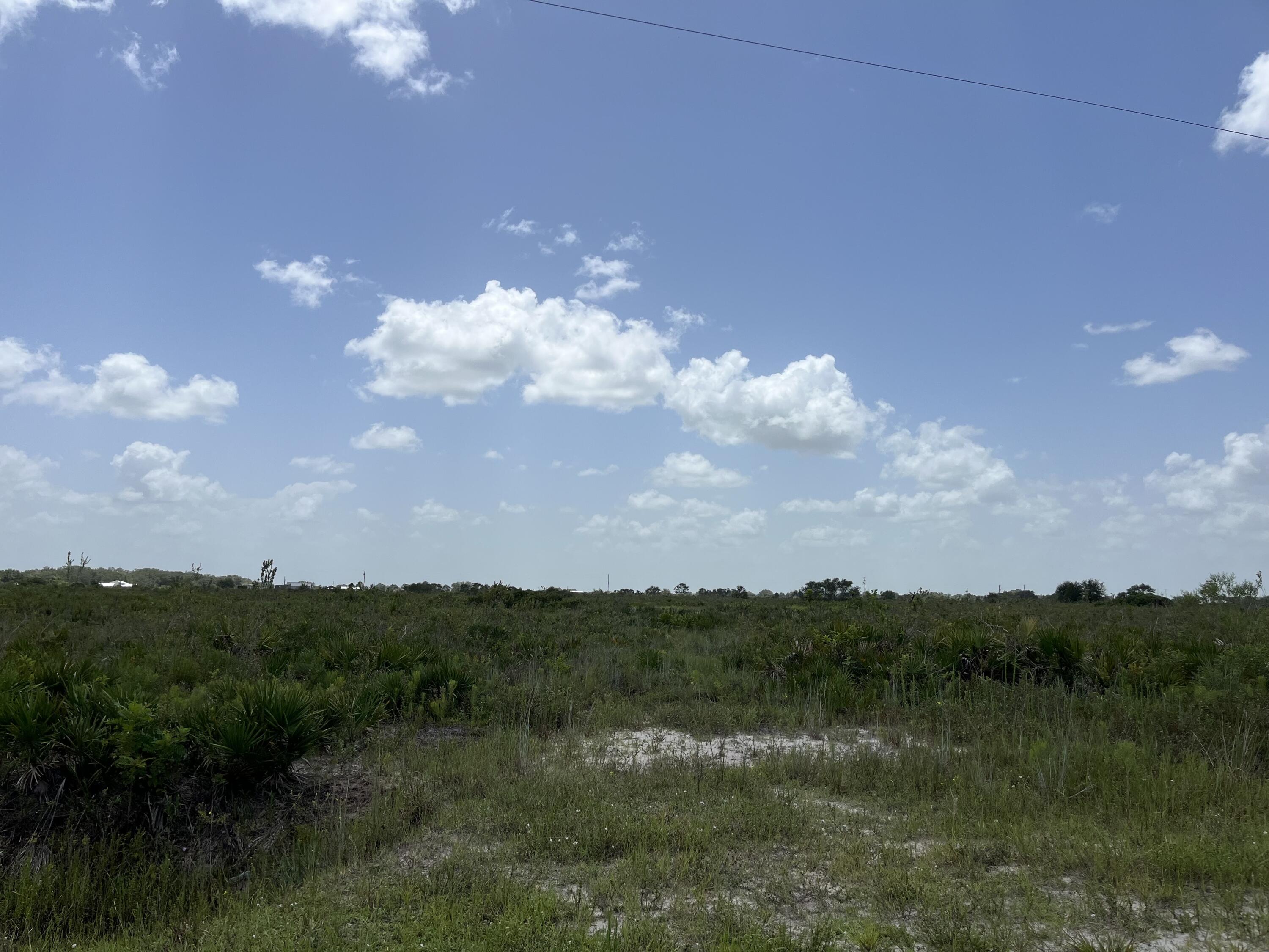 20106 Northwest 254th Street Okeechobee, FL 34972 - Photo 4 of 9 a view of a lake in middle of the town