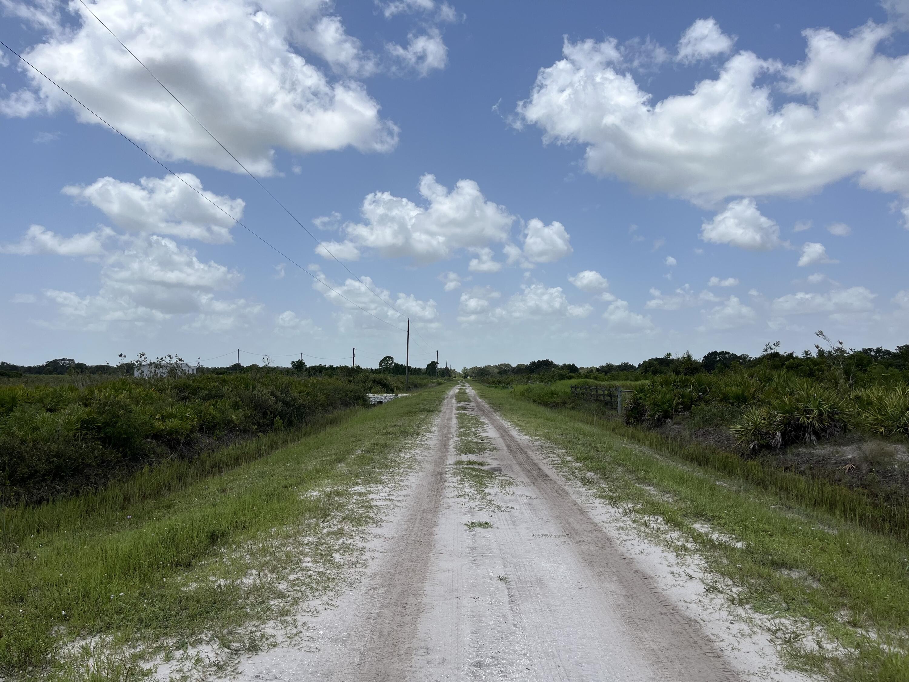 20106 Northwest 254th Street Okeechobee, FL 34972 - Photo 6 of 9 a view of lake with mountain