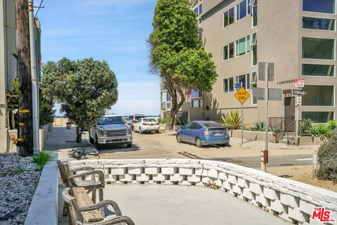 a view of a building with a street