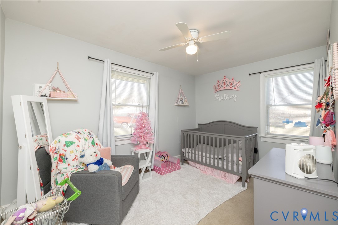 24601 Callear Road Petersburg, VA 23803 - Photo 17 of 32 a bedroom with furniture and a window