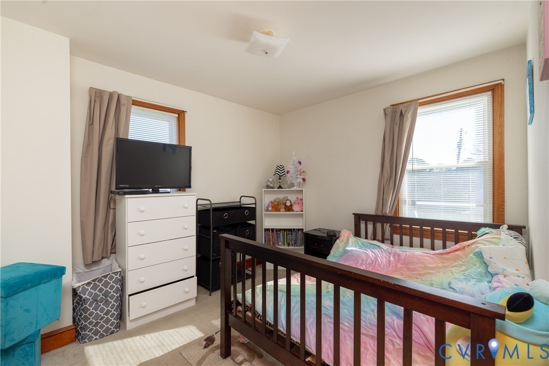 24601 Callear Road Petersburg, VA 23803 - Photo 19 of 32 a bedroom with furniture and a window