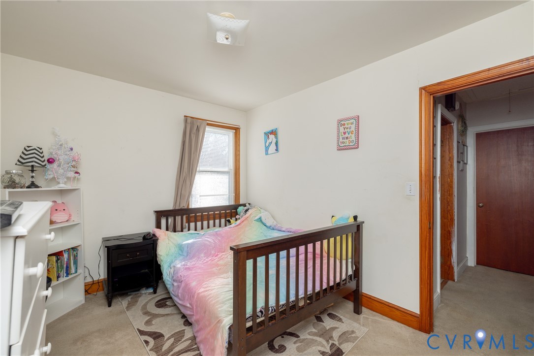 24601 Callear Road Petersburg, VA 23803 - Photo 20 of 32 a bedroom with furniture and a window