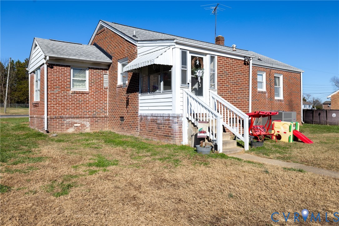 24601 Callear Road Petersburg, VA 23803 - Photo 23 of 32 a view of a house with a yard