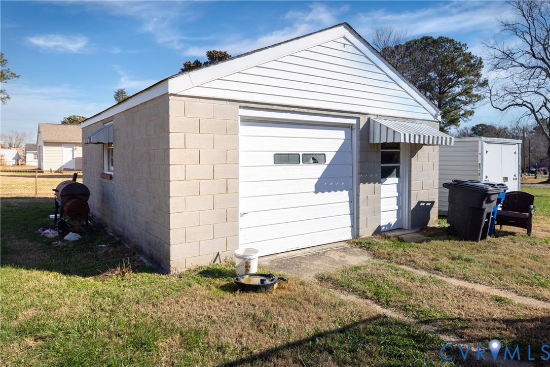 24601 Callear Road Petersburg, VA 23803 - Photo 25 of 32 a view of a house with backyard