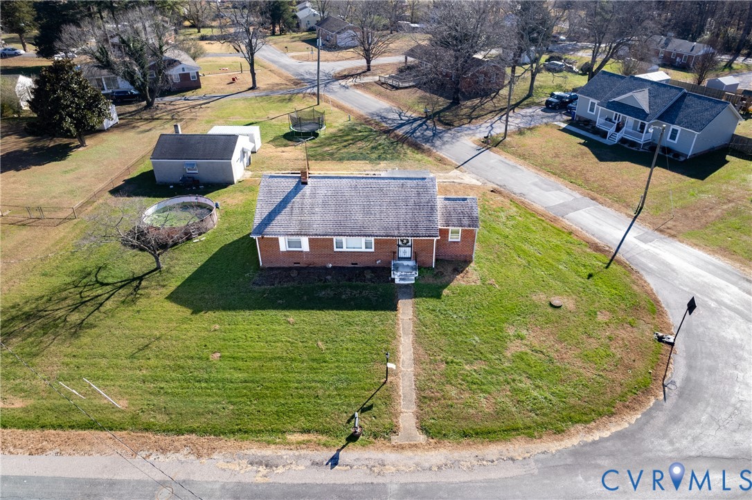 24601 Callear Road Petersburg, VA 23803 - Photo 28 of 32 a view of a swimming pool with a yard