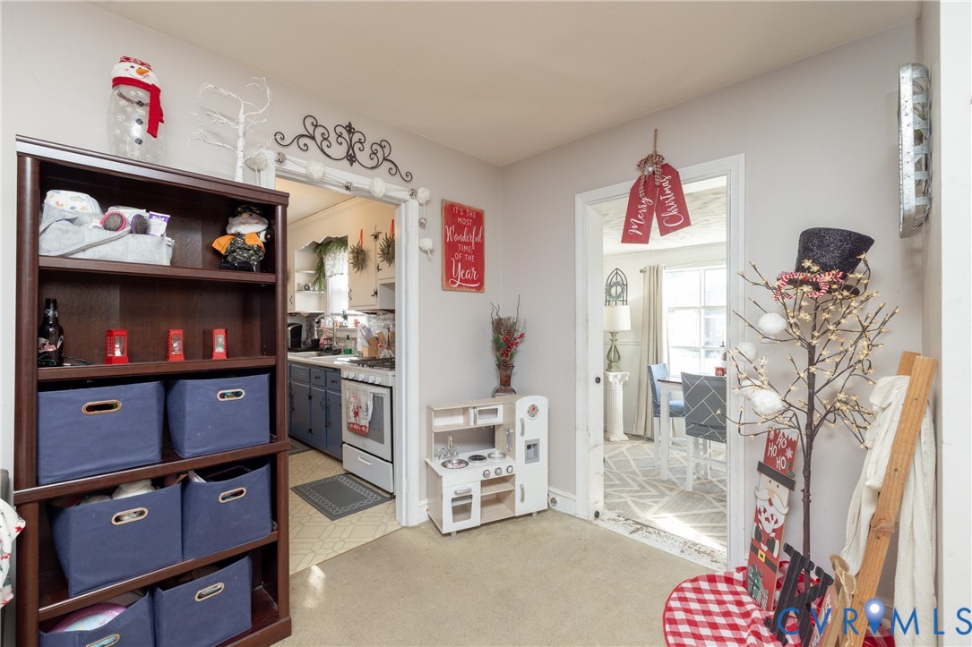 24601 Callear Road Petersburg, VA 23803 - Photo 6 of 32 a view of living room with furniture and a flat screen tv