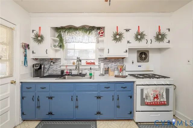 a view of kitchen with wooden floor