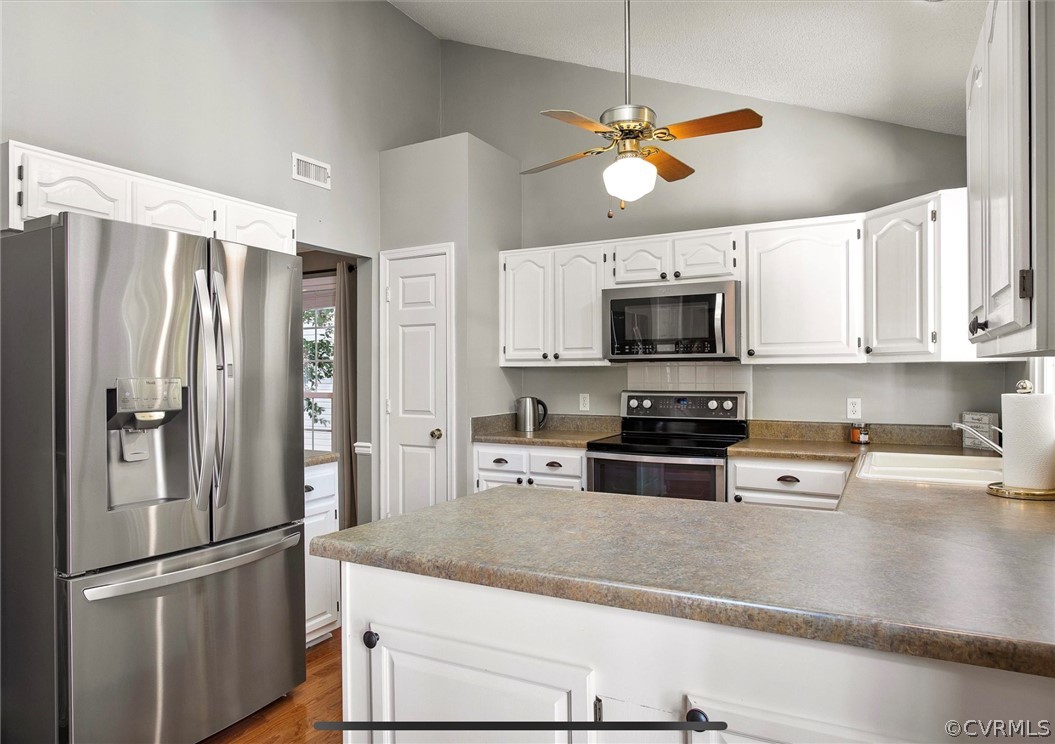 2804 Cove Ridge Road Midlothian, VA 23112 - Photo 5 of 28 a kitchen with granite countertop a refrigerator oven and a sink