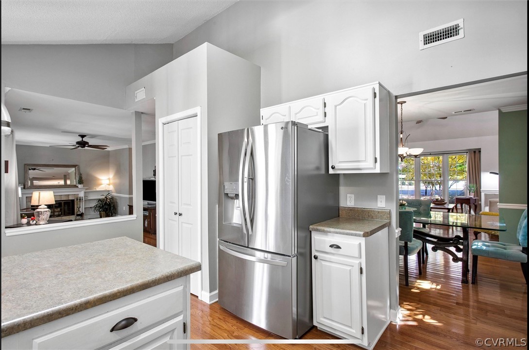 2804 Cove Ridge Road Midlothian, VA 23112 - Photo 8 of 28 a kitchen with stainless steel appliances a refrigerator stove microwave and cabinets