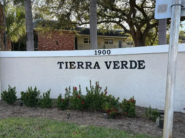 a sign that is on the side of a building