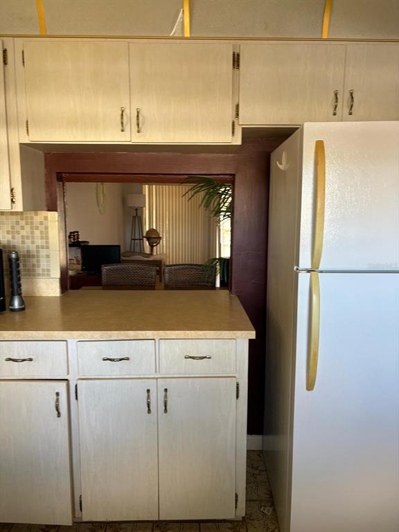 1900 South Kanner Highway, Unit 5204 Stuart, FL 34994 - Photo 4 of 25 a utility room with dryer and washer