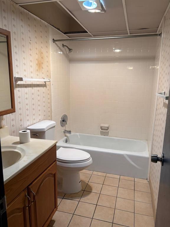 1900 South Kanner Highway, Unit 5204 Stuart, FL 34994 - Photo 7 of 25 a bathroom with a sink a toilet and shower