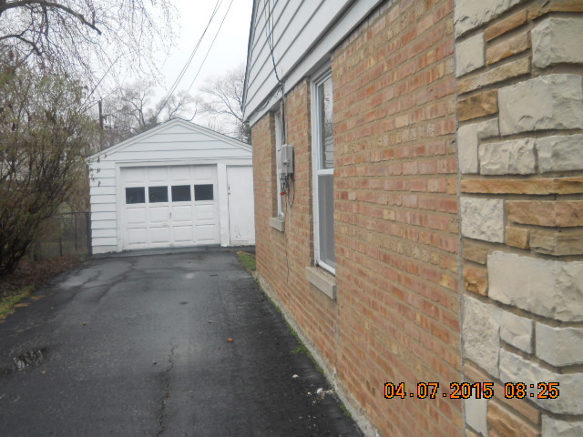 17560 Howe Avenue Homewood, IL 60430 - Photo 2 of 9 a view of a house with a street