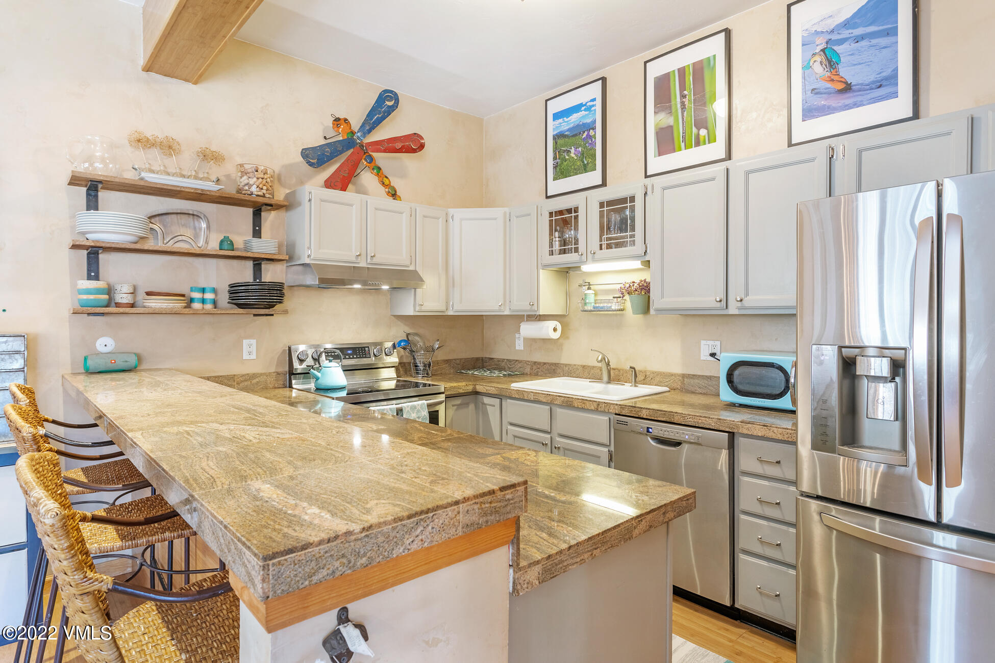195 Gopher Road, Unit 39 Avon, CO 81620 - Photo 1 of 24 a kitchen with stainless steel appliances granite countertop a sink stove and refrigerator