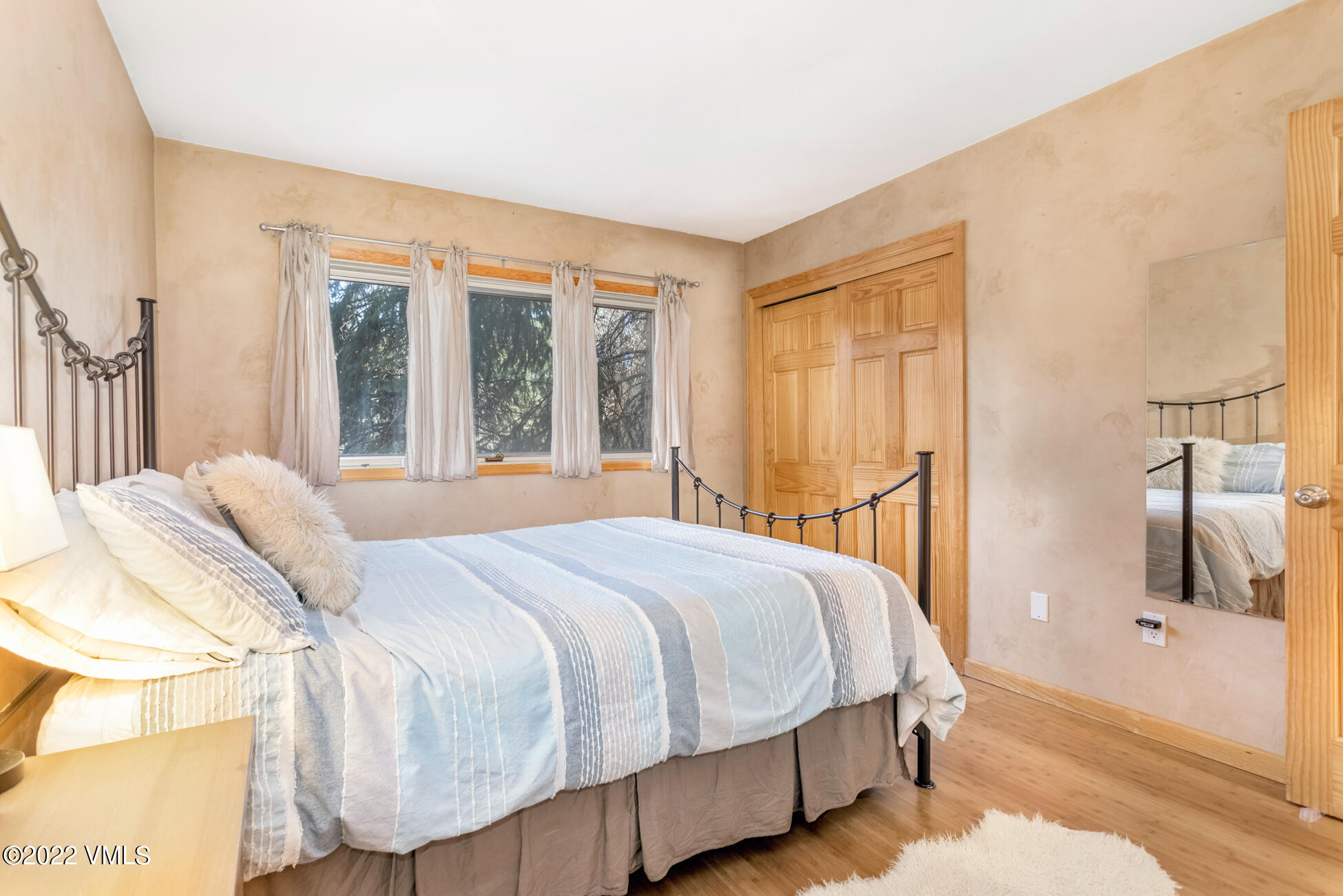 195 Gopher Road, Unit 39 Avon, CO 81620 - Photo 12 of 24 a bedroom with a bed and a window