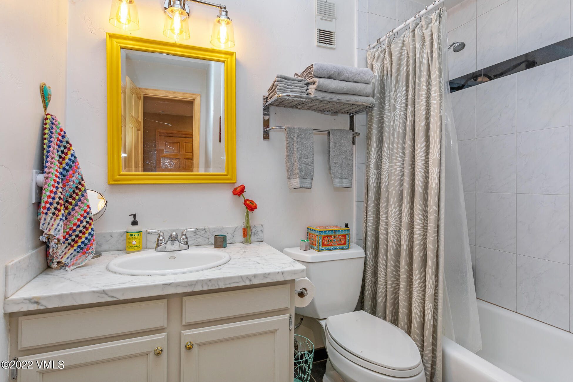 195 Gopher Road, Unit 39 Avon, CO 81620 - Photo 15 of 24 a bathroom with a sink toilet and vanity