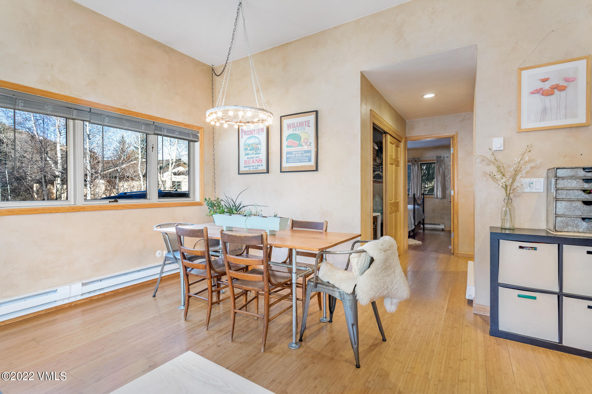 195 Gopher Road, Unit 39 Avon, CO 81620 - Photo 10 of 24 a view of a dining room with furniture and a wooden floor