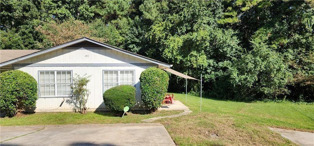205 Glenview Terrace Winder, GA 30680 - Photo 7 of 31 a front view of a house with garden