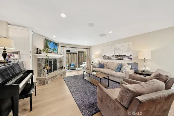 a living room with furniture and a table
