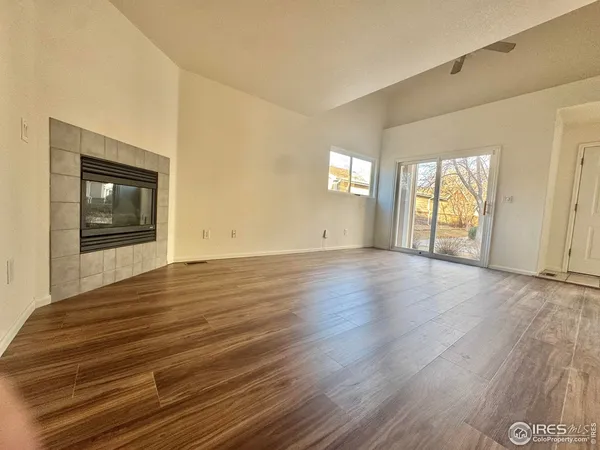 a kitchen with granite countertop a sink and steel appliances
