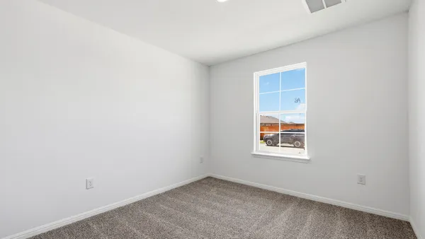 an empty room with a window