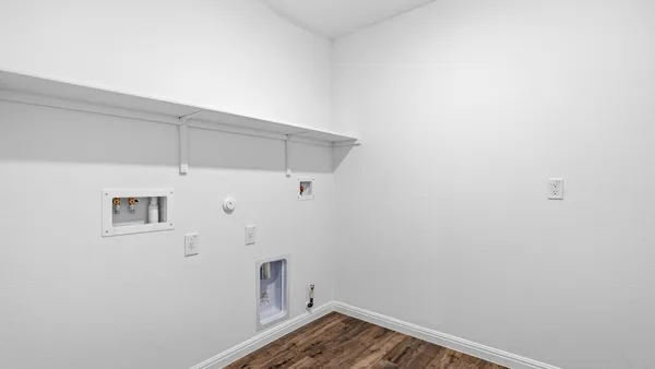 a view of small space with wooden floor