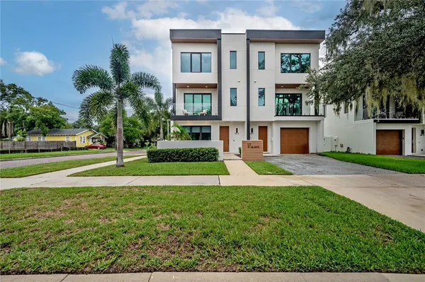 a view of a house with a swimming pool