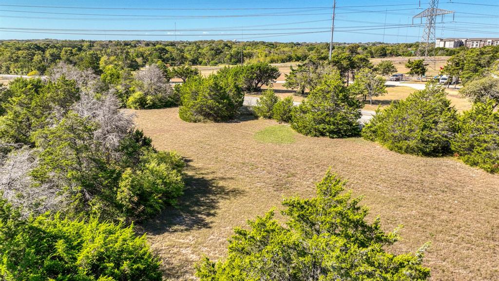 1922 West Pleasant Run Road DeSoto, TX 75115 - Photo 6 of 9 a view of a yard with wooden fence