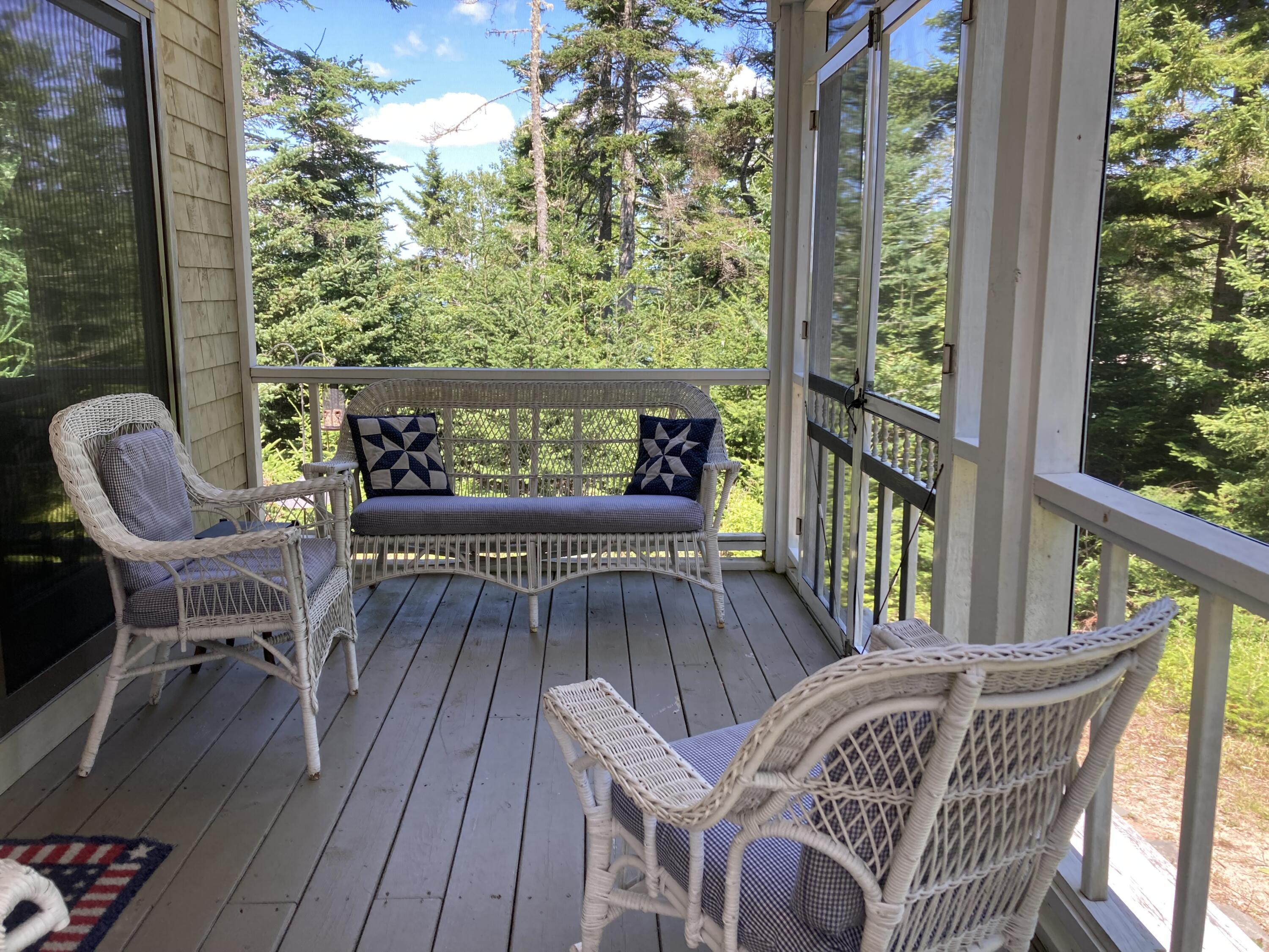 207 Goods Point Road Steuben, ME 04680 - Photo 14 of 56 Screened porch on waterside.