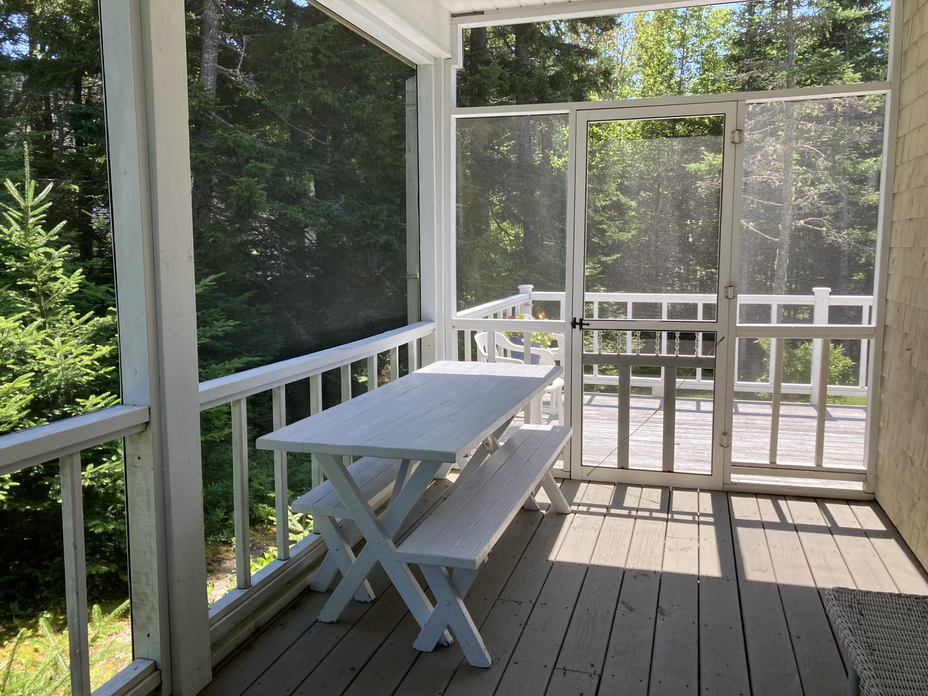 207 Goods Point Road Steuben, ME 04680 - Photo 15 of 56 Eating area of porch to open deck.