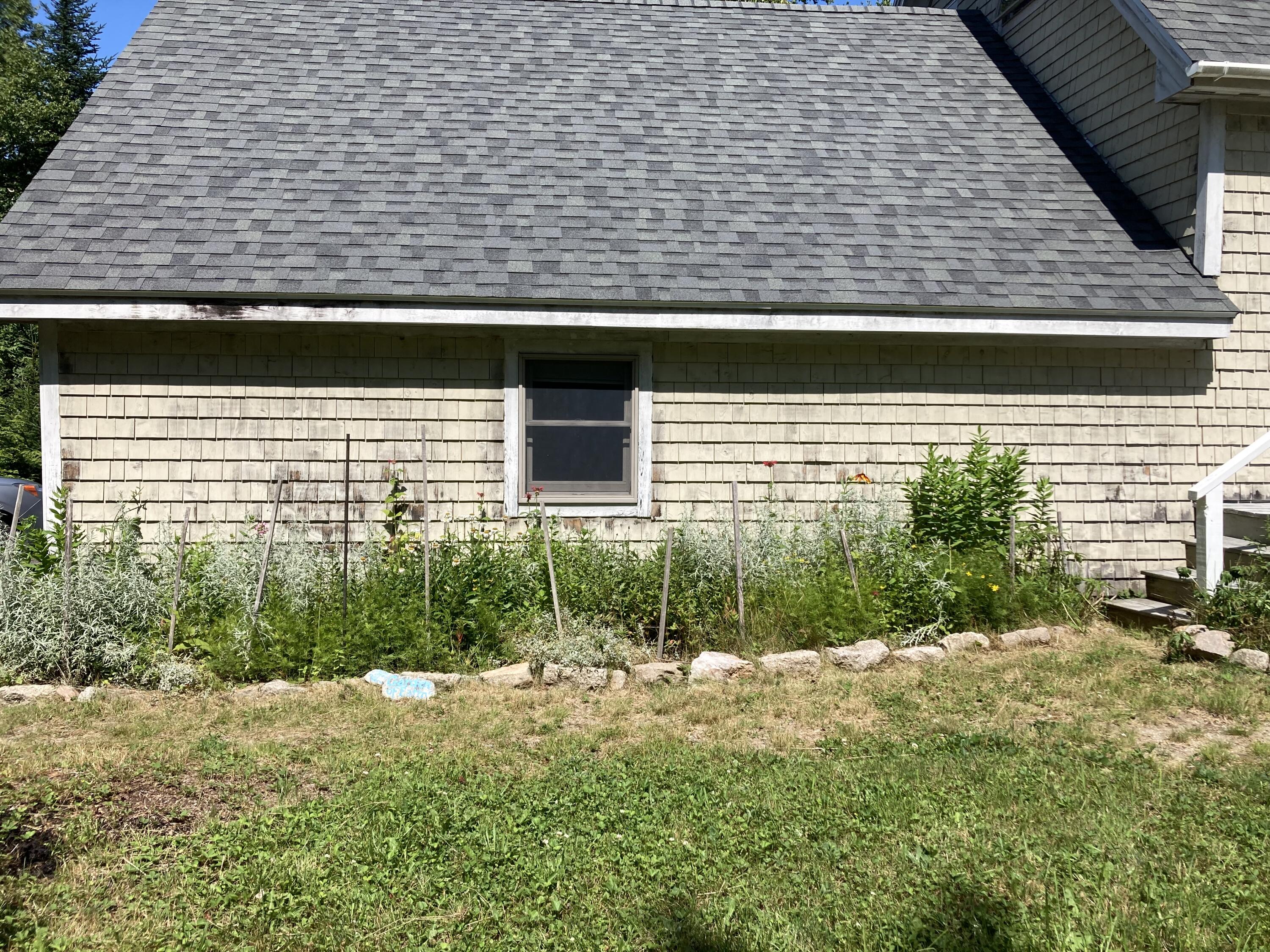 207 Goods Point Road Steuben, ME 04680 - Photo 32 of 56 Attached garage & garden area.