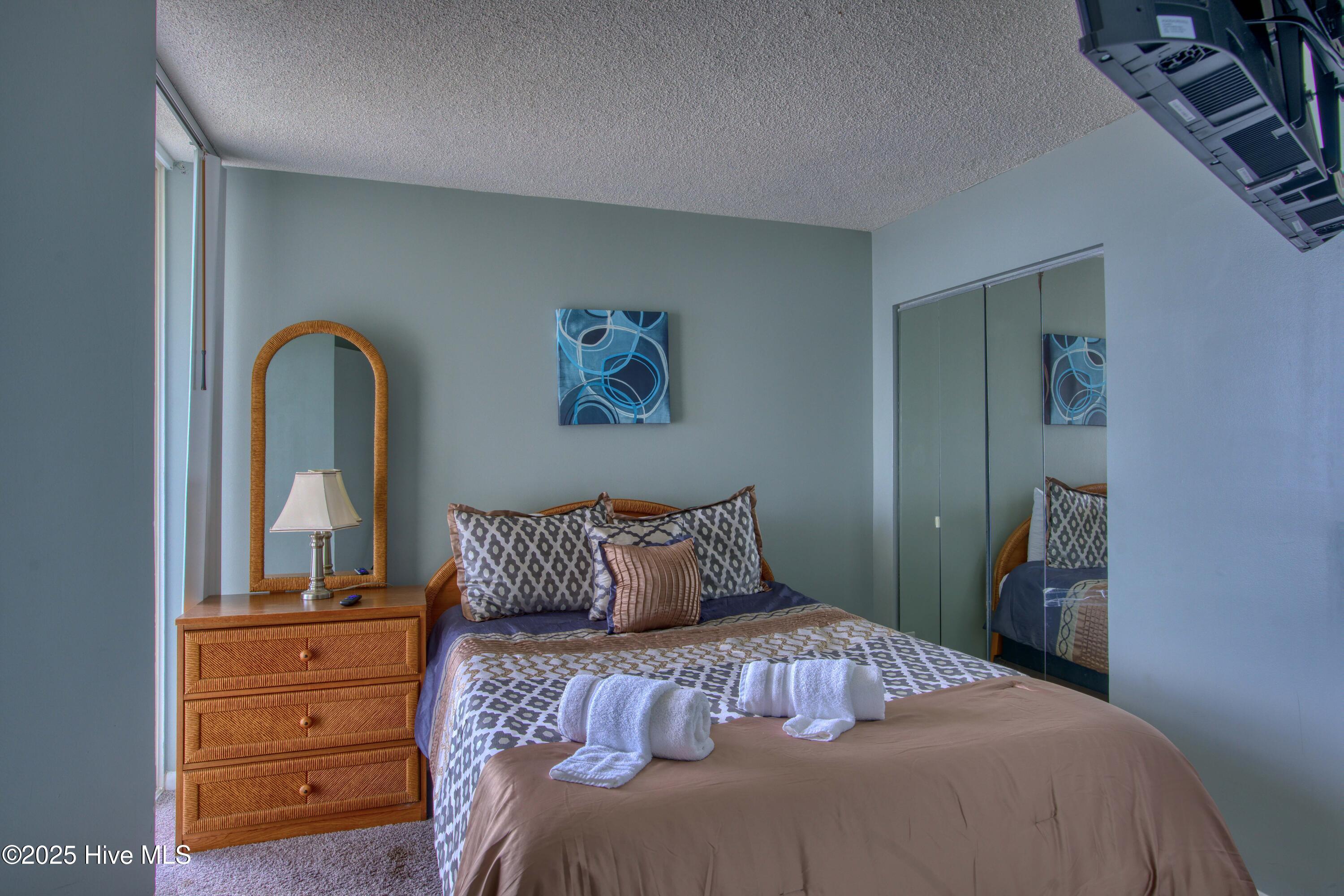 2000 New River Inlet Road, Unit 1207 North Topsail Beach, NC 28460 - Photo 12 of 30 1207 St. Regis - Living room and Bedroom