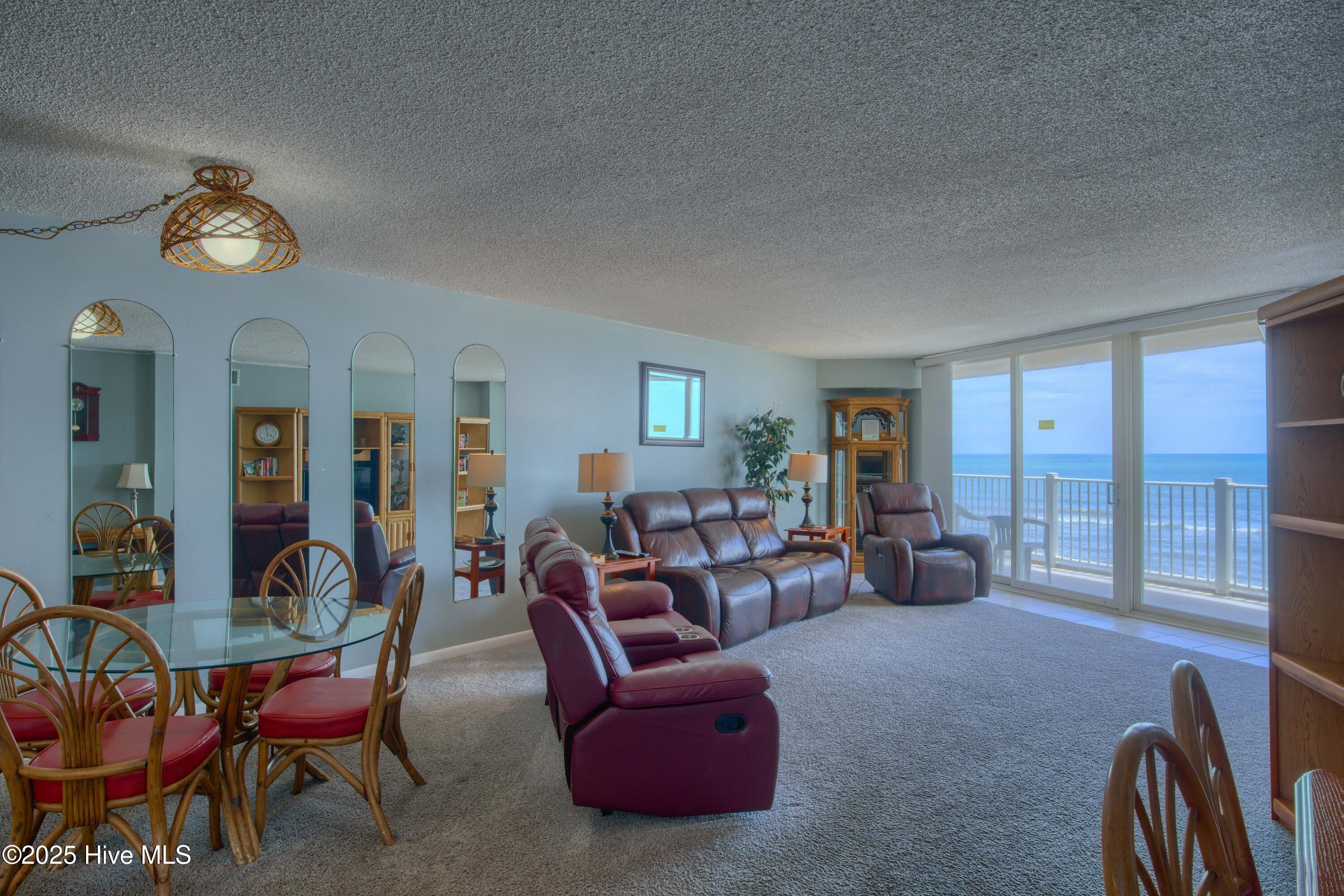 2000 New River Inlet Road, Unit 1207 North Topsail Beach, NC 28460 - Photo 17 of 30 1207 St. Regis - Living room and Bedroom
