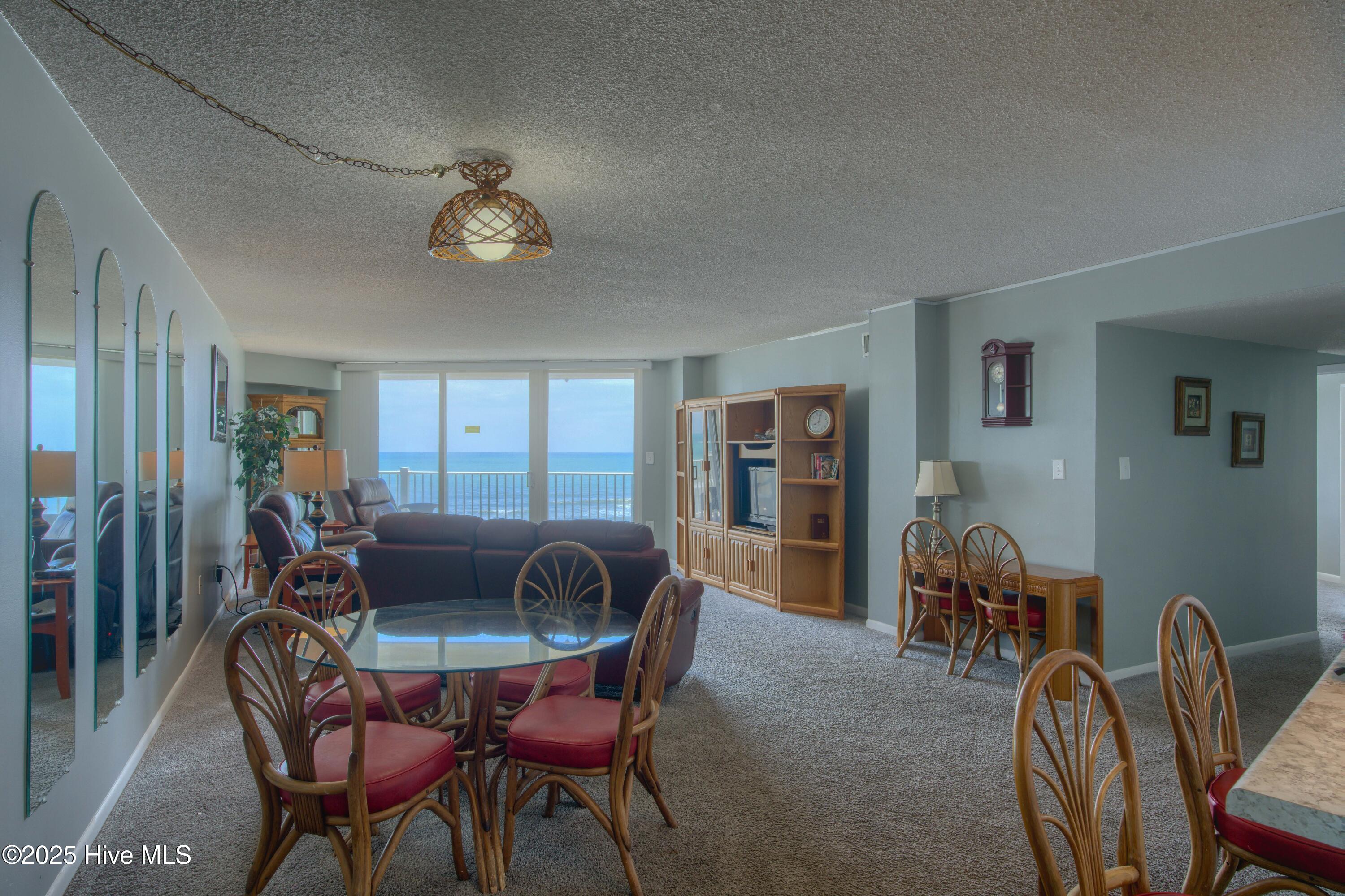 2000 New River Inlet Road, Unit 1207 North Topsail Beach, NC 28460 - Photo 19 of 30 1207 St. Regis - Living room and Bedroom