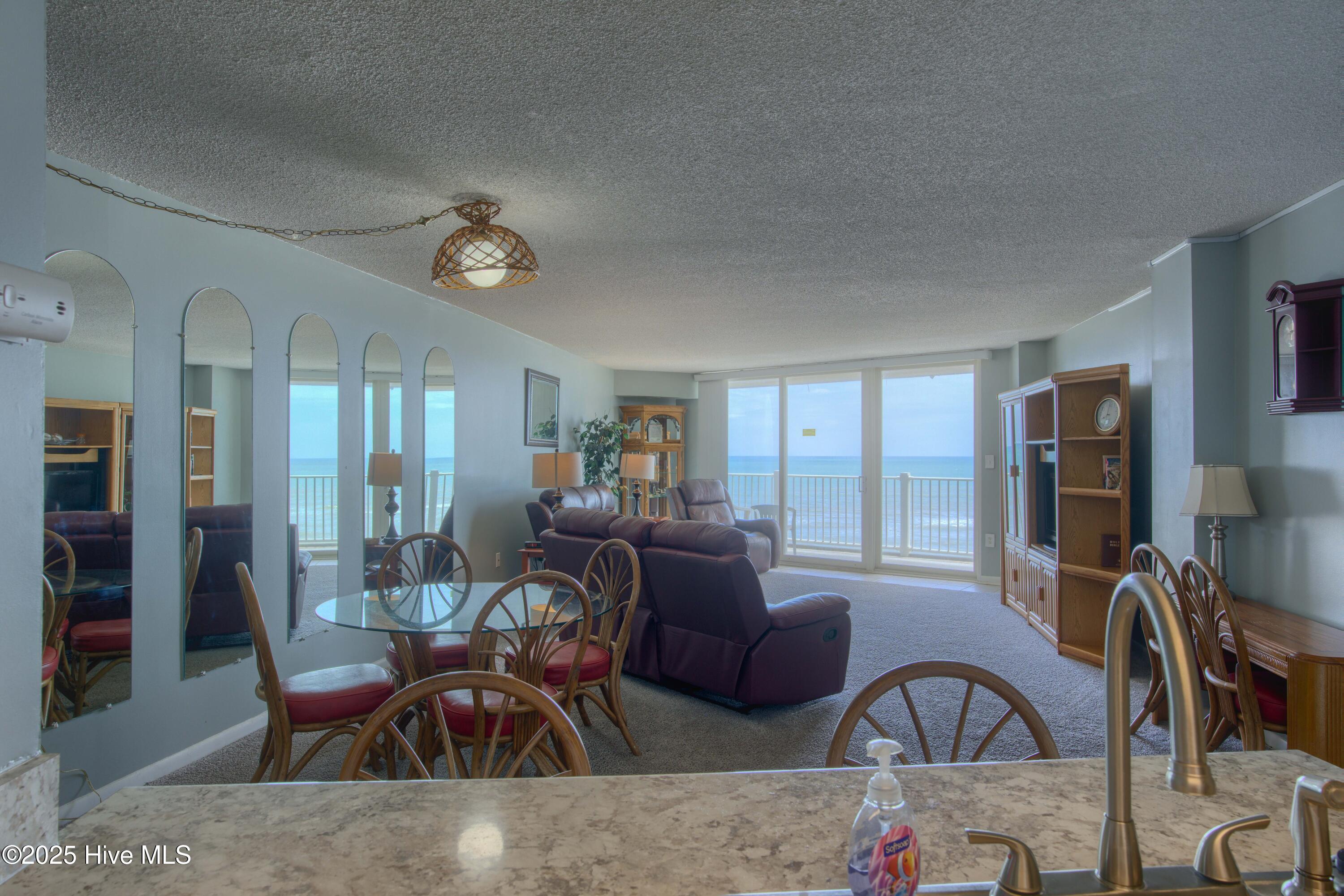 2000 New River Inlet Road, Unit 1207 North Topsail Beach, NC 28460 - Photo 20 of 30 1207 St. Regis - Living room and Bedroom